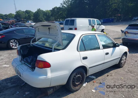 2000 Toyota Corolla Ce z USA, uszkodzony, nr VIN 2T1BR12E6YC342194